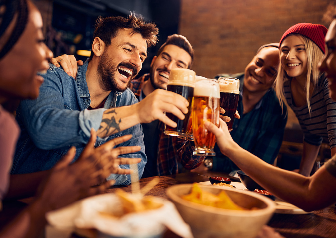 Friends holding beer