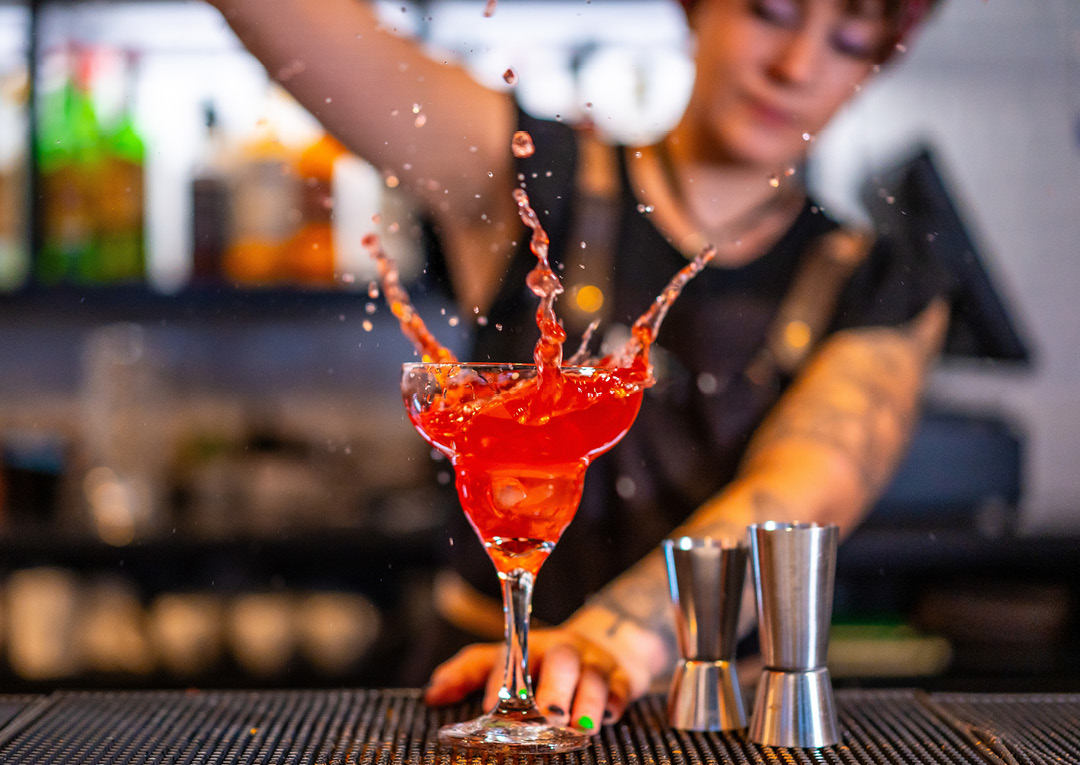 Bartender pouring a drink