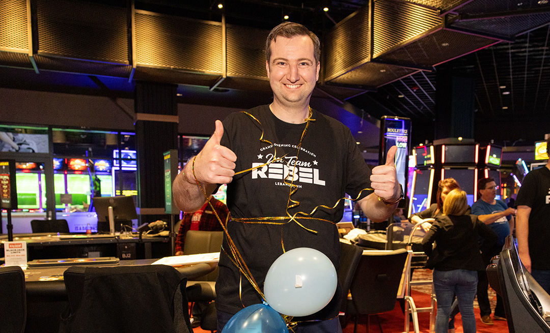 Team Member with thumbs up